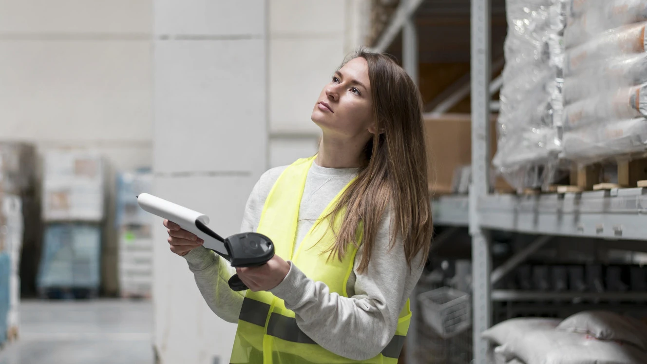 medium shot woman holding clipboard